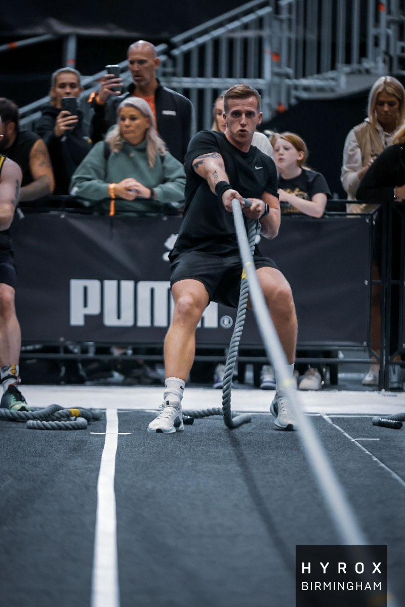 Sam at Hyrox Birmingham — battle ropes